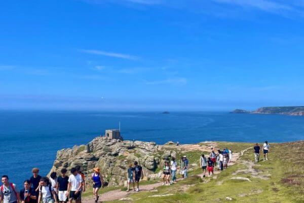 Students walking on the coast path from Sennen to Land's End.