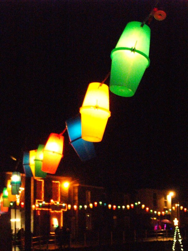Mousehole harbour lanterns at Christmas.