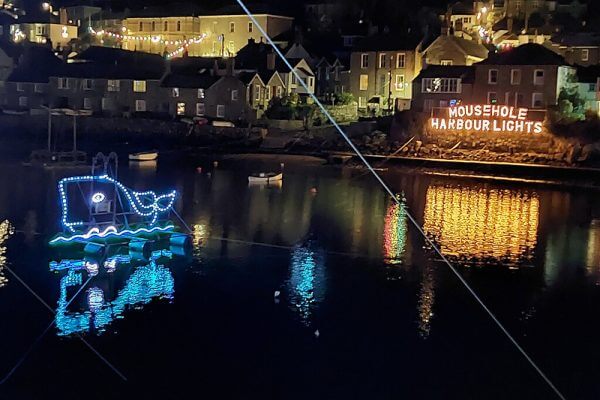 Mousehole harbour at Christmas.
