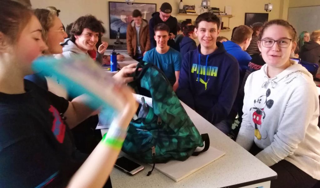 Junior summer school students in a classroom.
